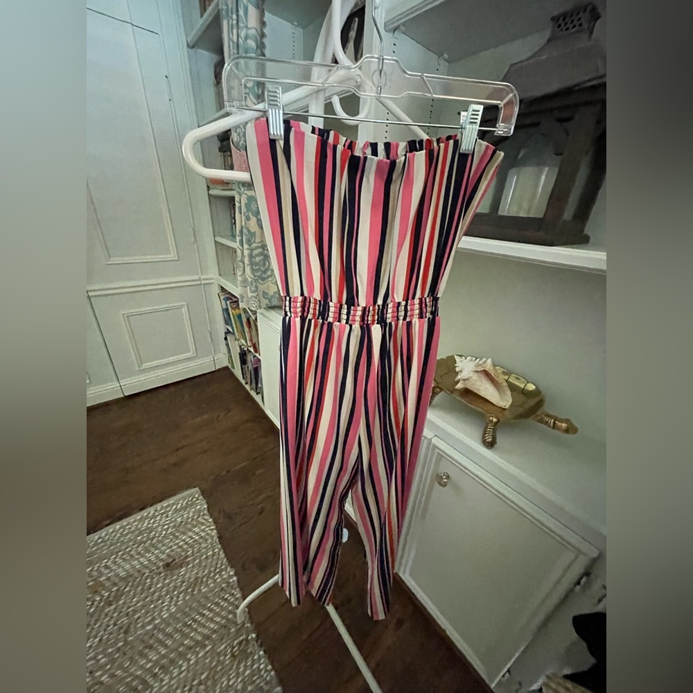 Socialite jumper in pink,white,and blue.
